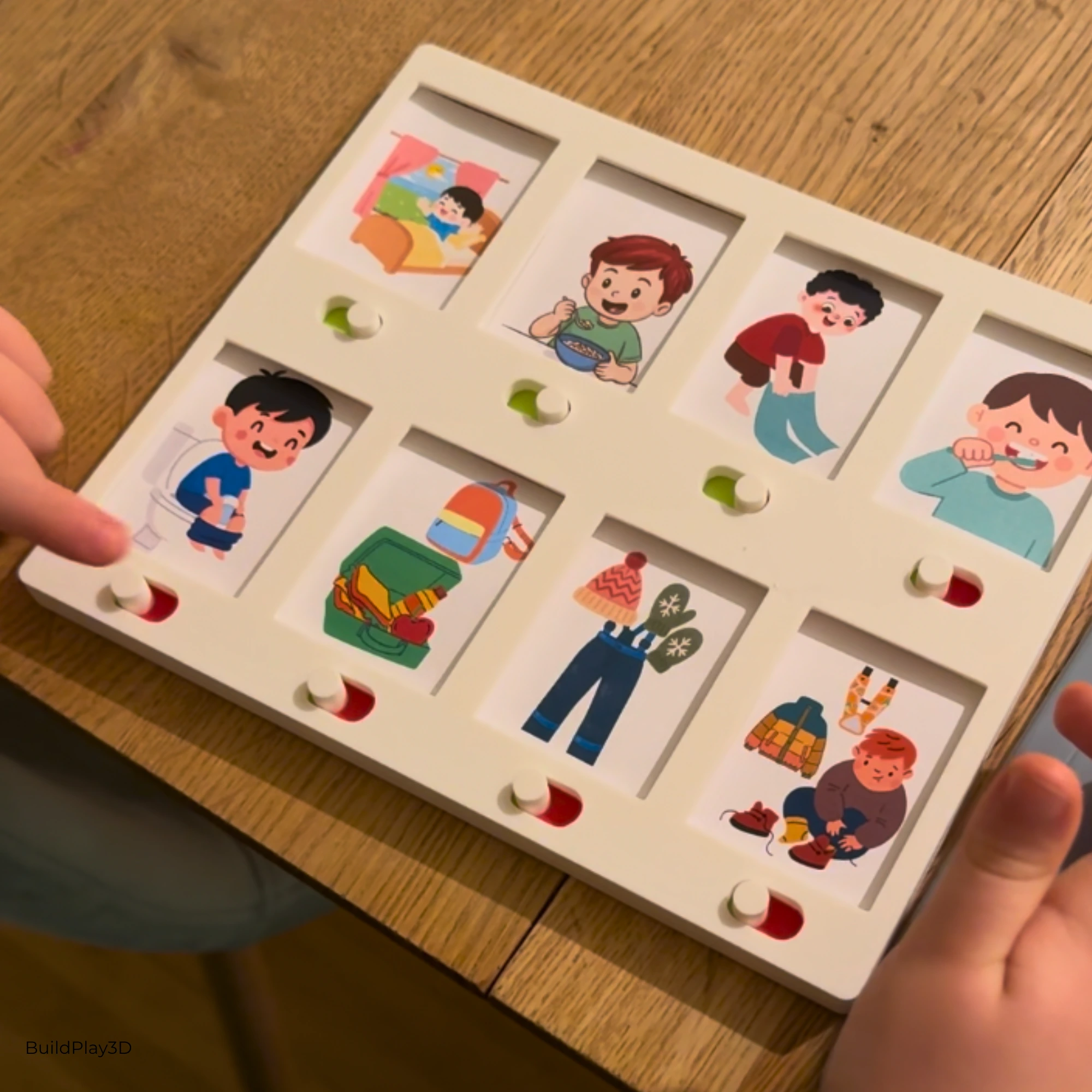 Kind bedient einen Montessori 3D-Druck Routine-Tracker mit farbigen Schiebereglern und Illustrationen typischer Morgenroutinen wie Aufstehen, Zähneputzen, Essen und Anziehen.